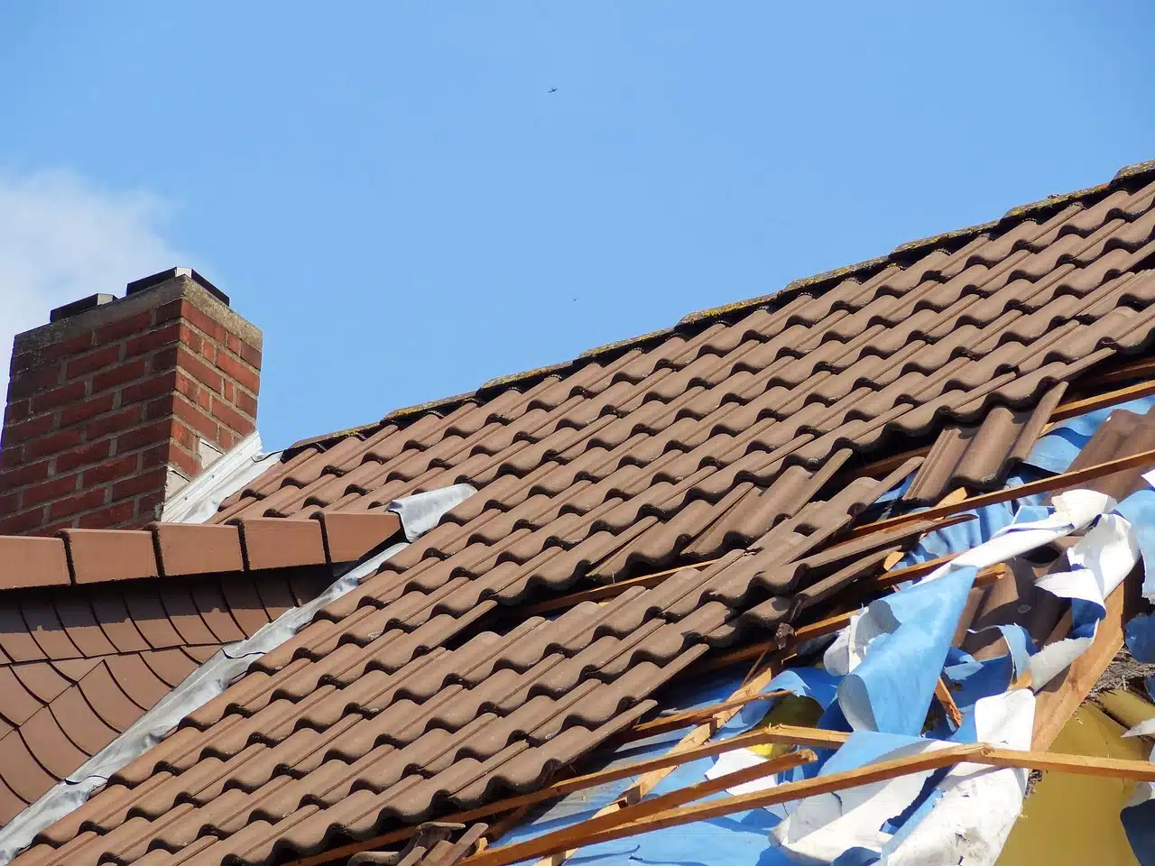 Roof that is damaged due to strong weather.