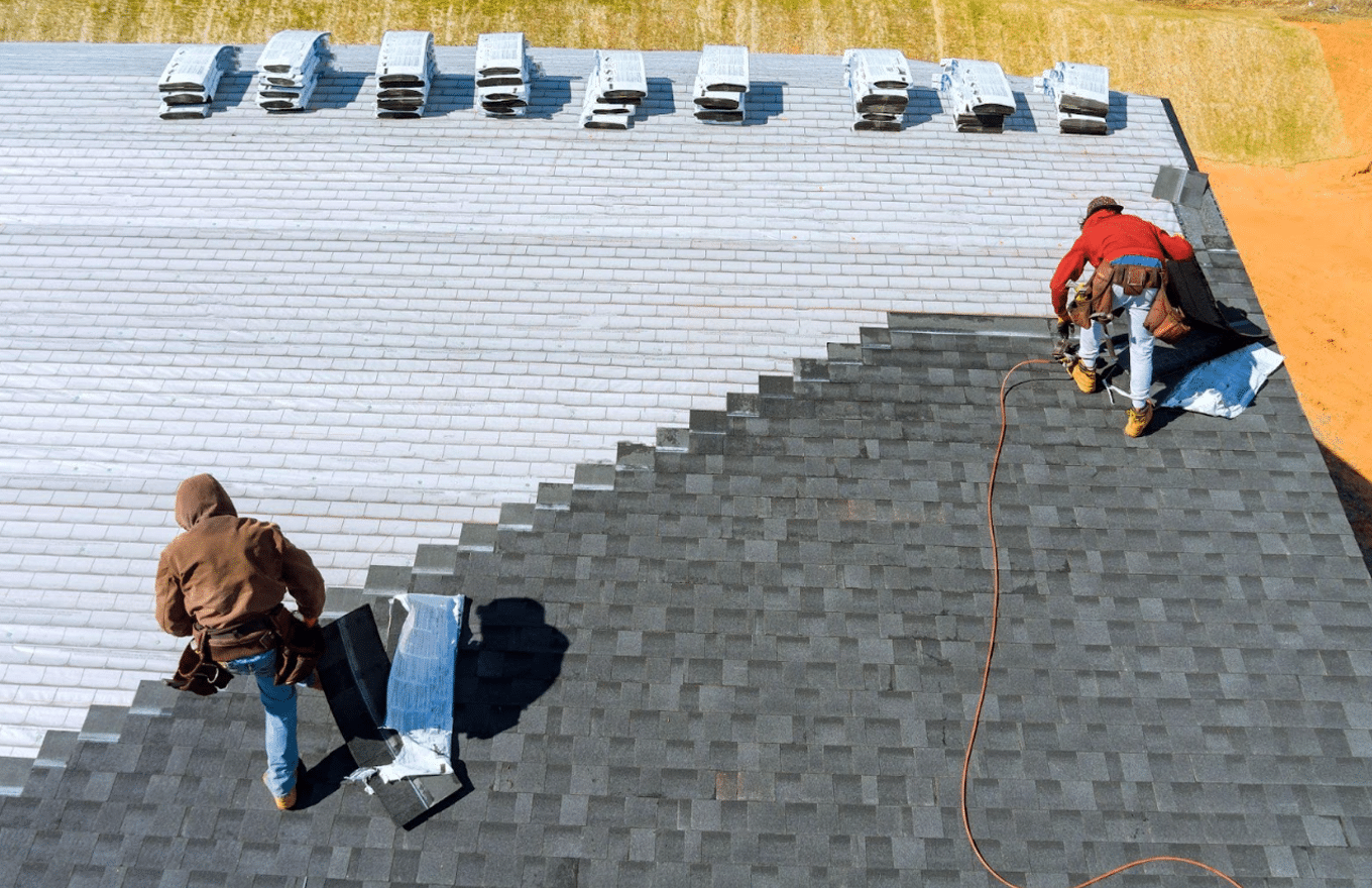 Workers doing some repair and replacement of the roof materials