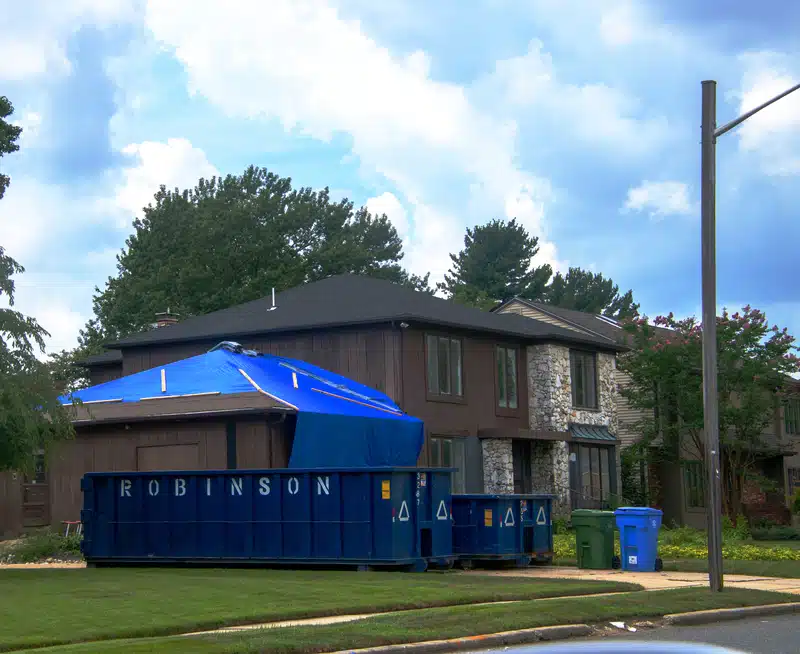 clipped emergency tarping on siding after hurricane