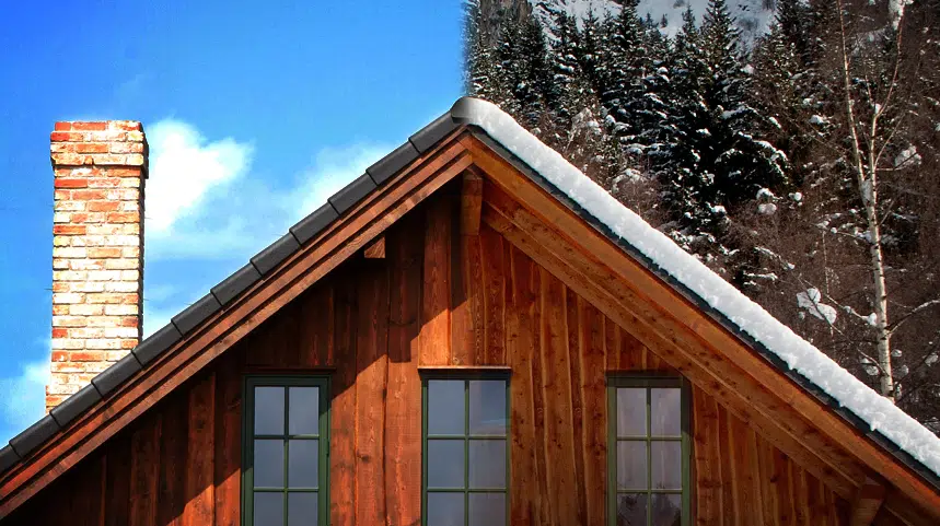 An image of a wooden house and its roof