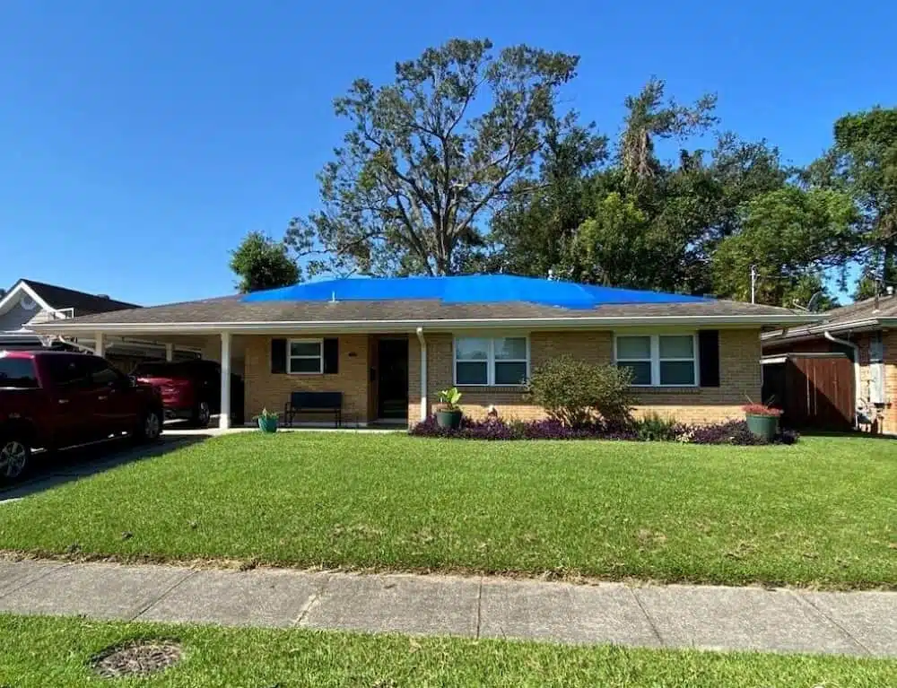 home under emergency roof tarping