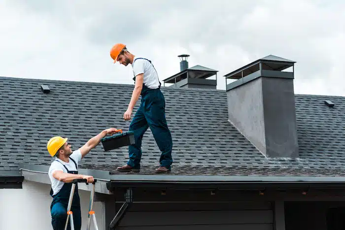 roof inspectors in sarasota doing repair