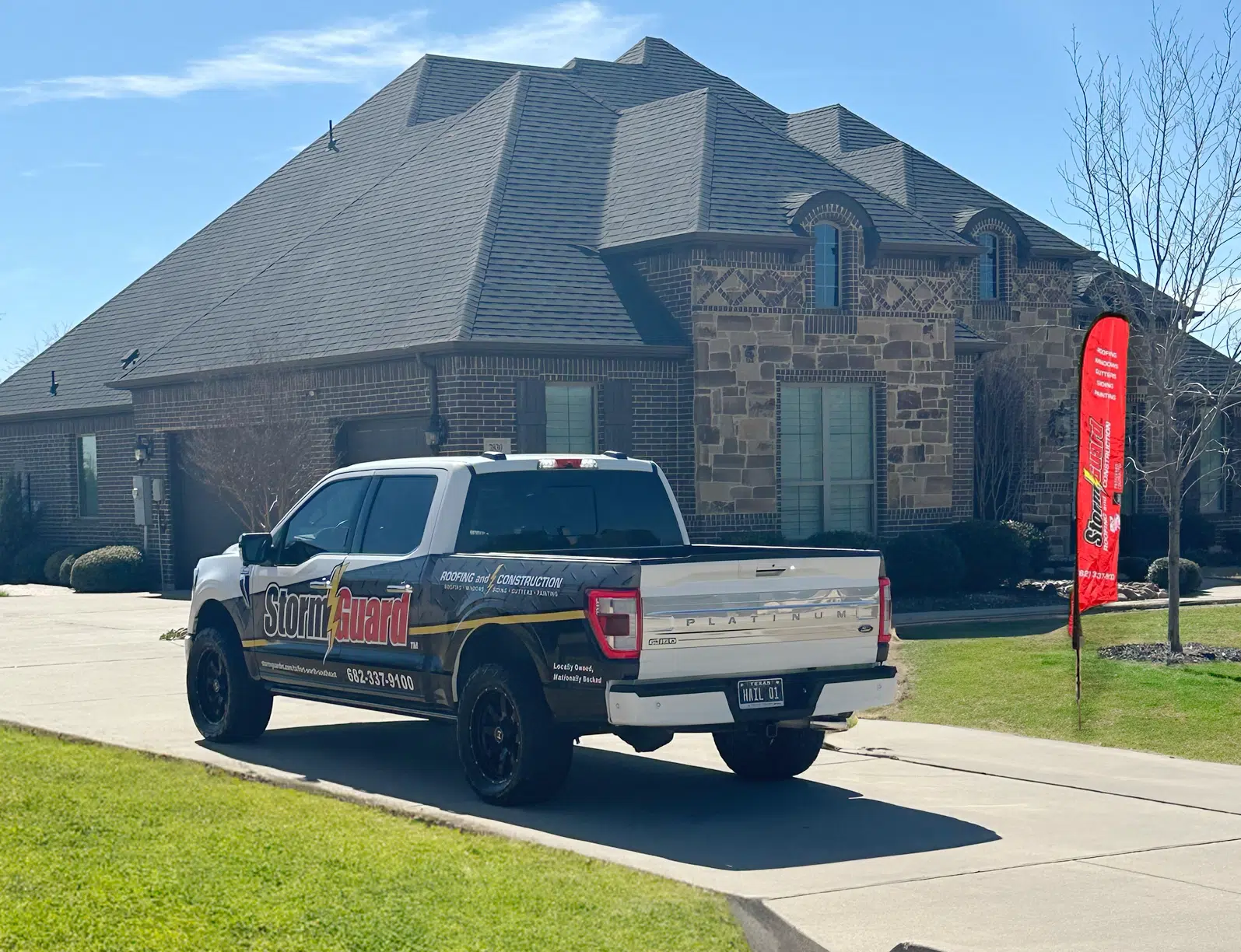 Brick House with Storm Guard Restoration Services Truck In Driveway - Forth Worth Southeast