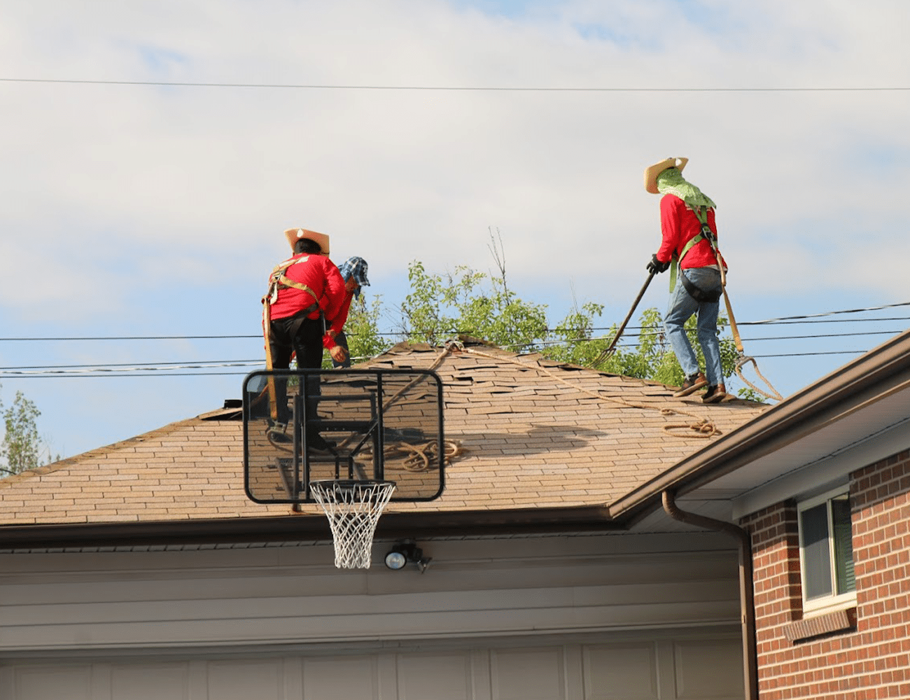 stormguard team working on roof repairs roofing insurance claims in New Orleans