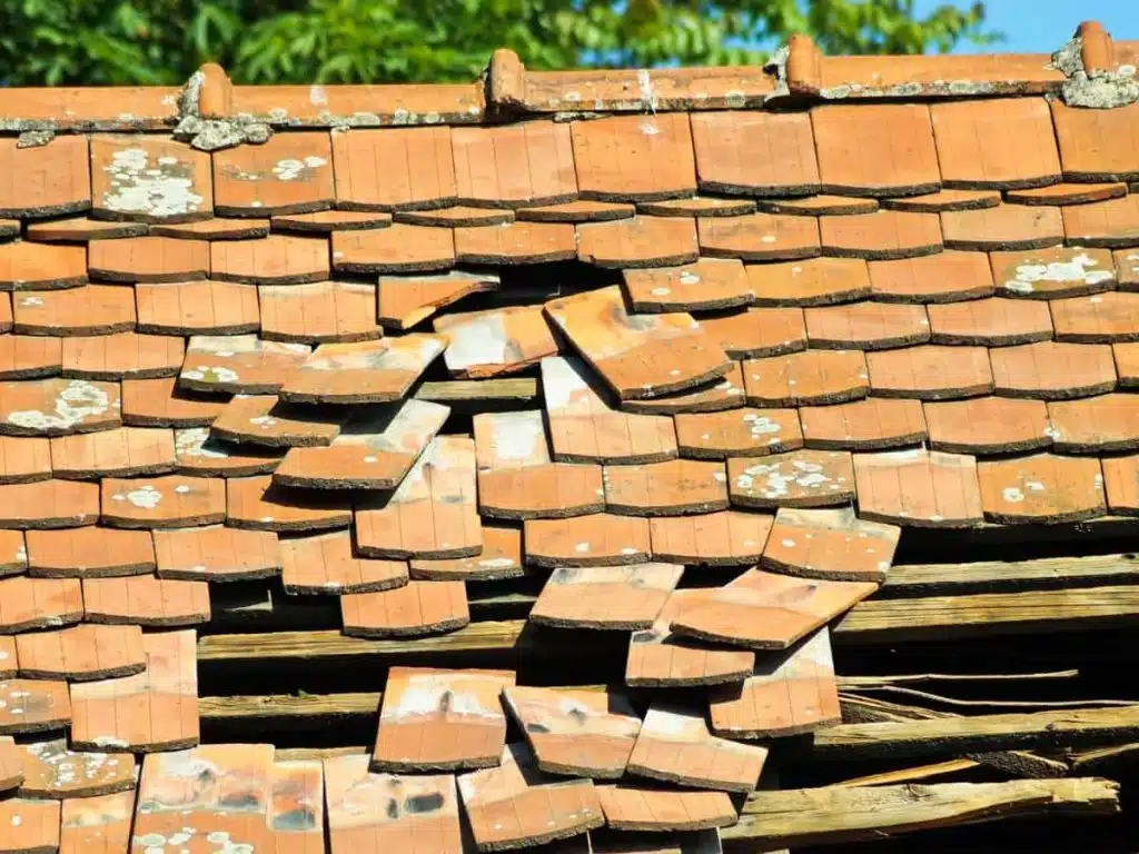 cedar roof damaged by the storm