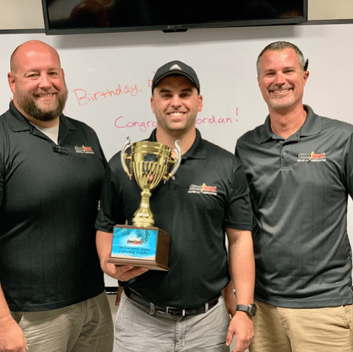 Three Storm Guard Franchise Owners Smiling